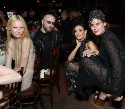 People at a party posing the camera.