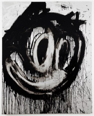A painting of a smiling cat that drips with black paint.
