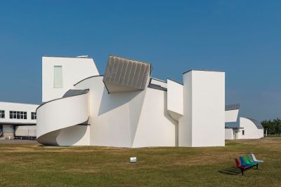 A white building composed of many evenly shaped forms.