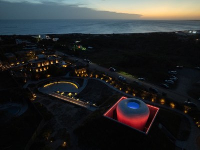 Aerial view of Skyspace experience "Ta Khut" created by James Turrell, at Posada Ayana in José Ignacio, Uruguay, on January 5, 2024. The bucolic countryside in eastern Uruguay, between seemingly endless golden beaches and undulating grasslands where cows outnumber residents, has become an unlikely hub for art, culture, and gastronomy, being home to Uruguay's only contemporary art museum. (Photo by Santiago MAZZAROVICH / AFP)