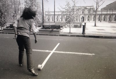 Photo documentation of Lotty Rosenfeld, Una Milla de Cruces Sobre el Pavimento (One mile of crosses on the pavement), 1979. Art action in front of the Moneda Palace,
Santiago de Chile, 1979. Courtesy Fundación Lotty Rosenfeld