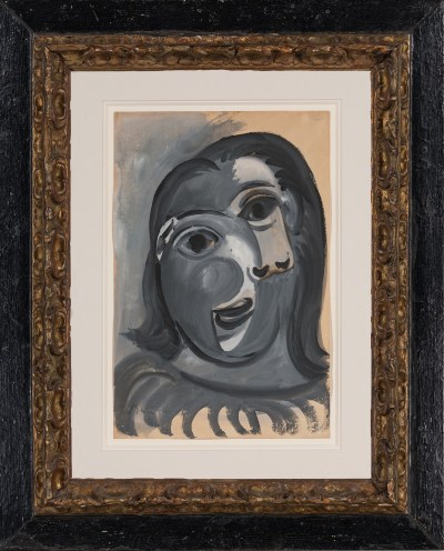 A stylized artwork by Pablo Picasso shows a young woman's head and shoulders