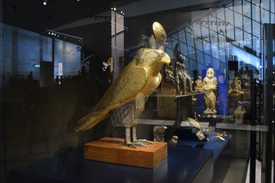 A golden falcon statue.