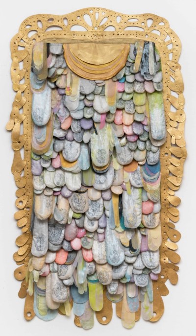 A framed painting featuring abstract spills of color.